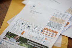 Unitywater bill lying on desk in pile of papers