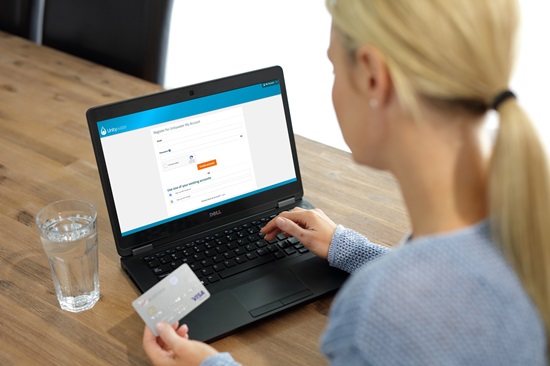 Women on laptop with credit card register My Account