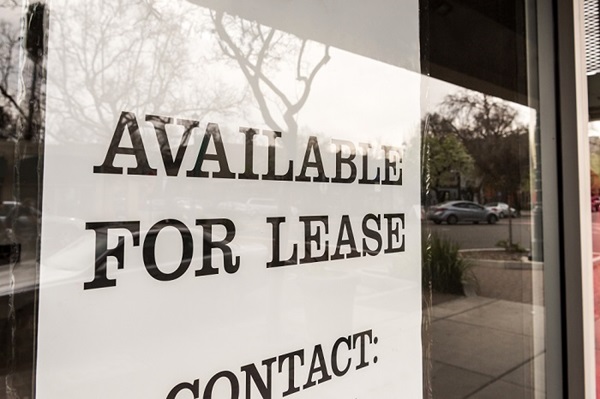 For Lease sign in commercial business window