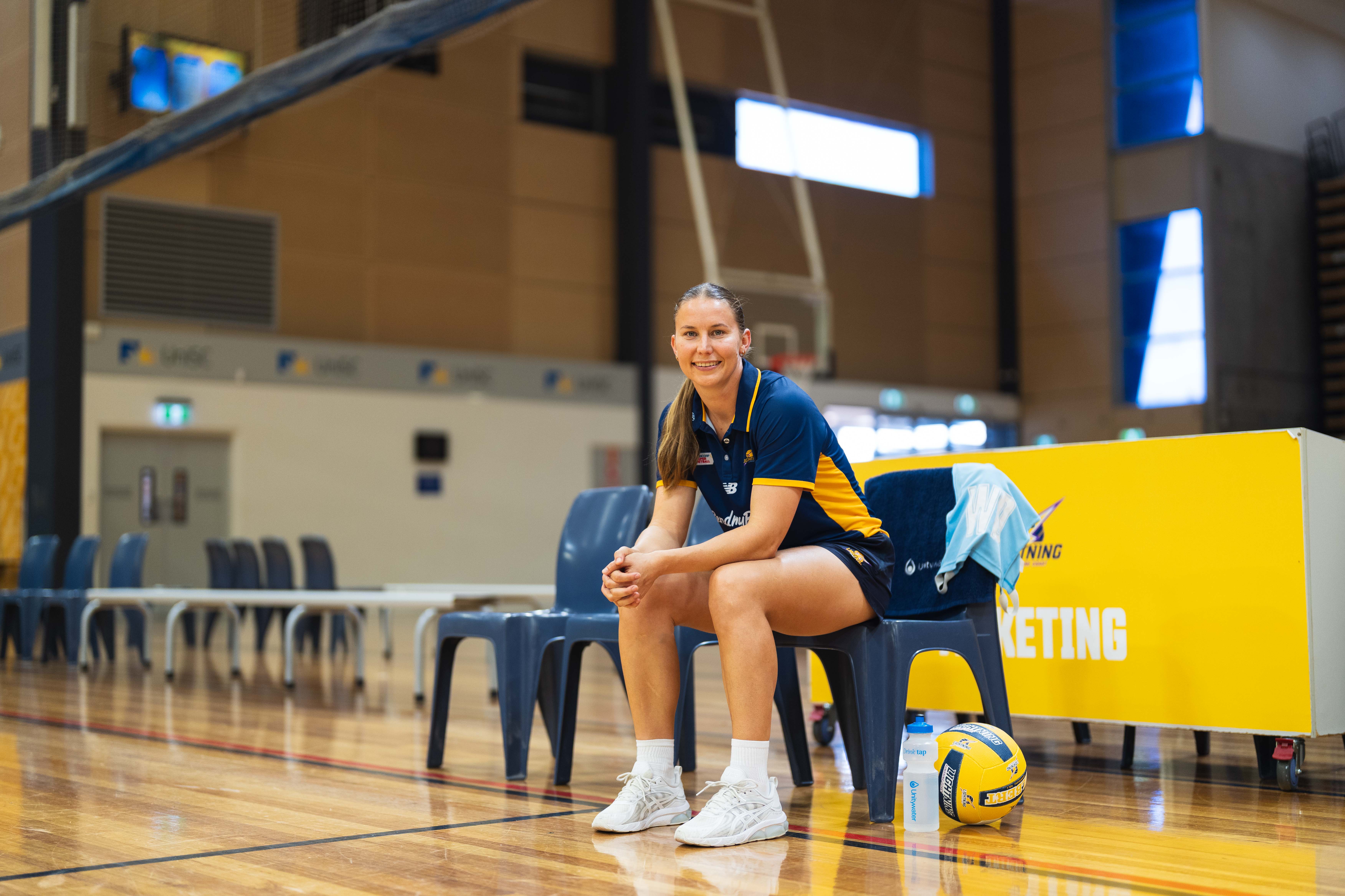 Mahalia Cassidy courtside with her reusable water bottle