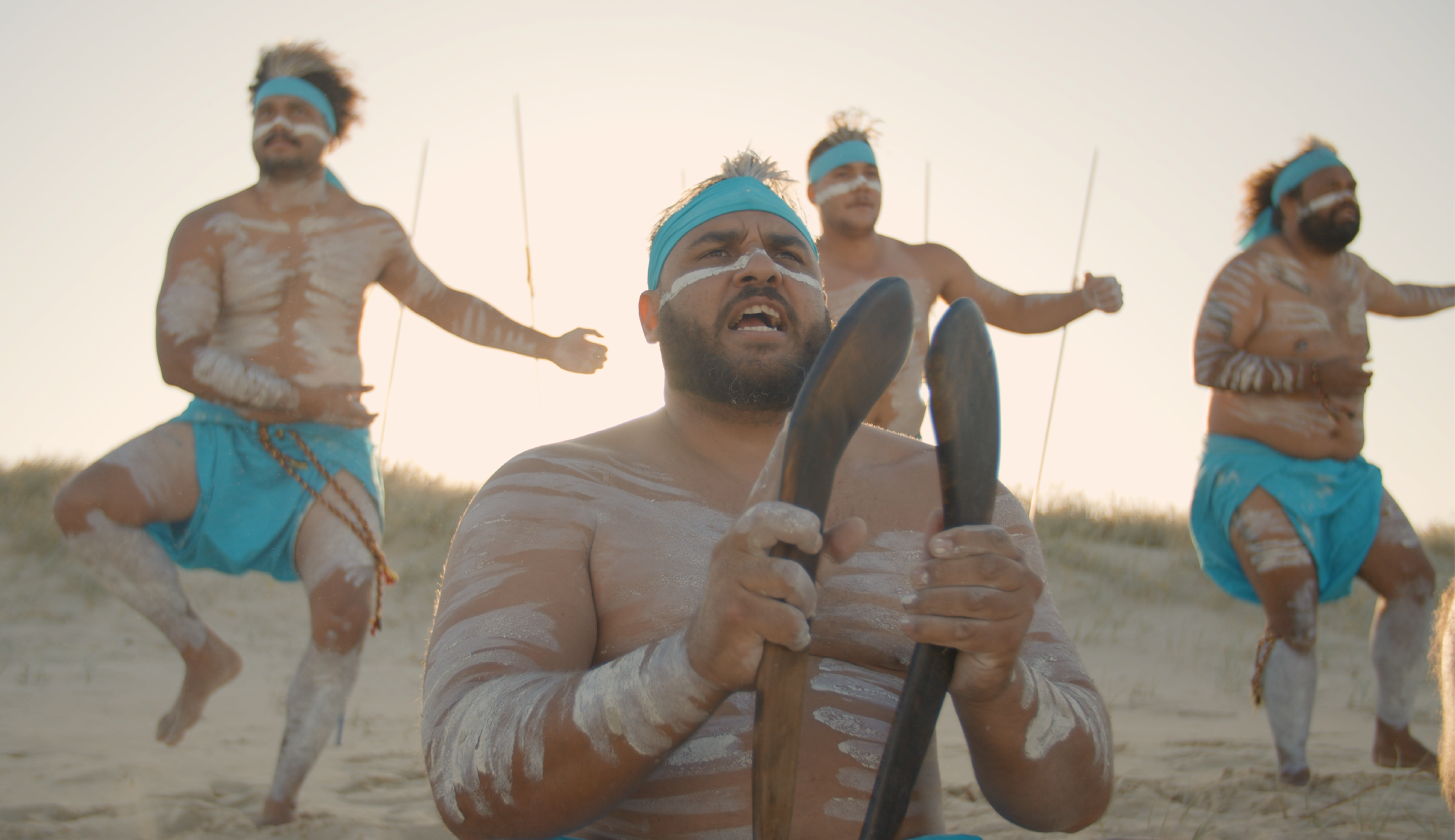 First Nations persons from Kabi Kabi land performing traditional dance