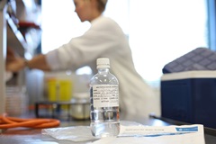 Water testing sample bottle in Unitywater Laboratory