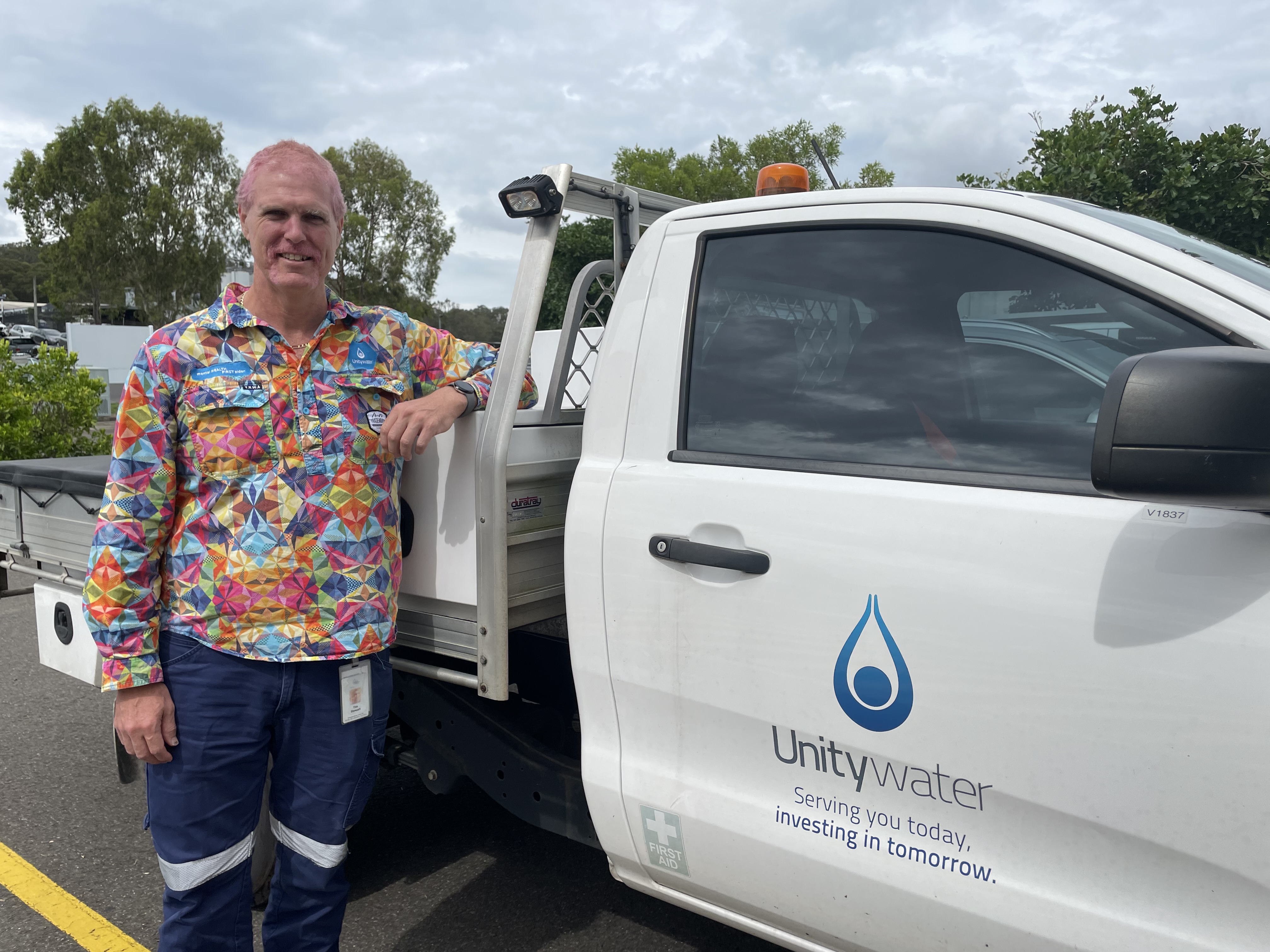 Infrastructure Standards Engineer Tim Stewart sports a pink ‘mo’ and hair. 