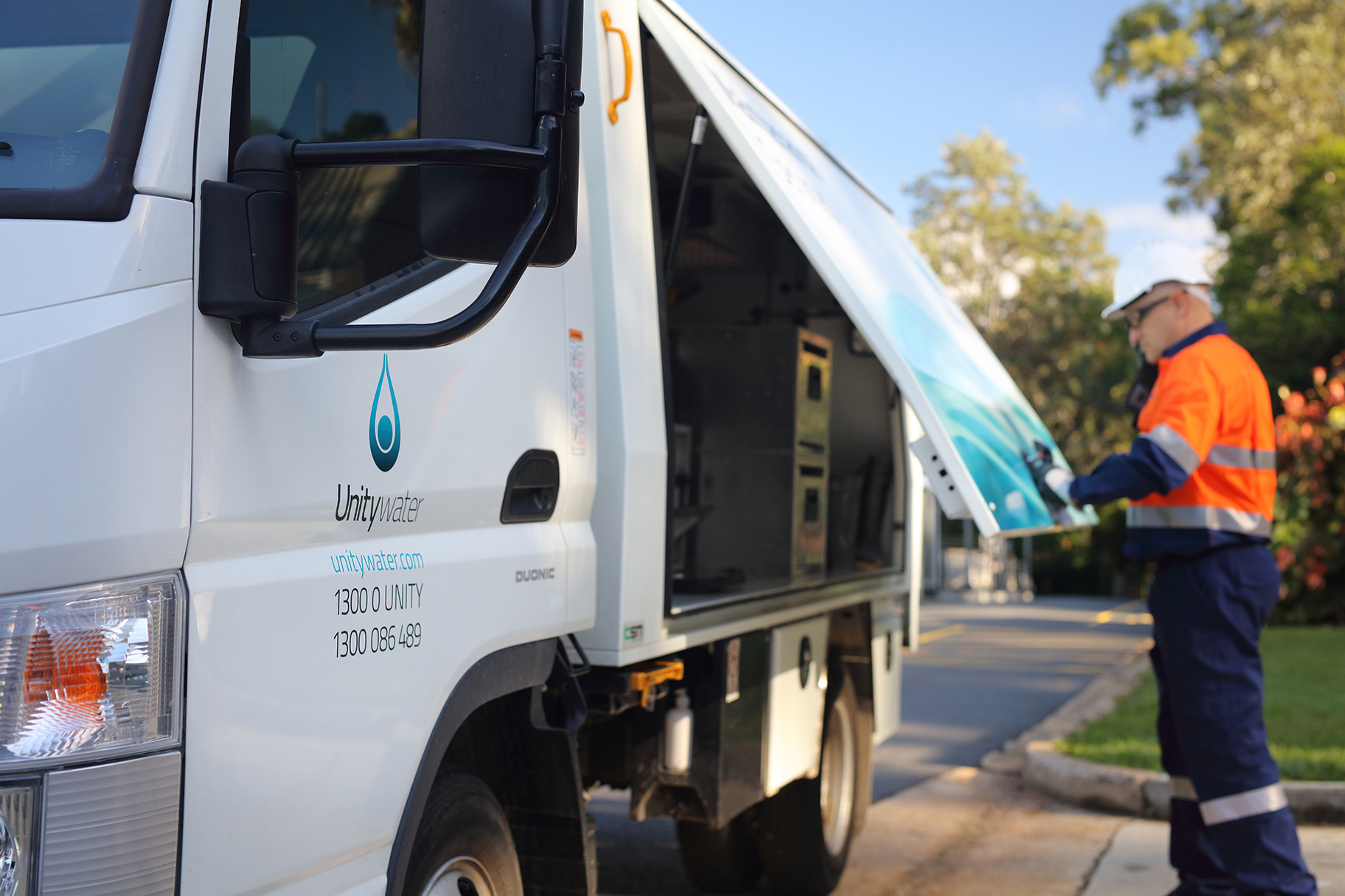 Male Field Crew staff member next to Unitywater Maintenance Services Truck
