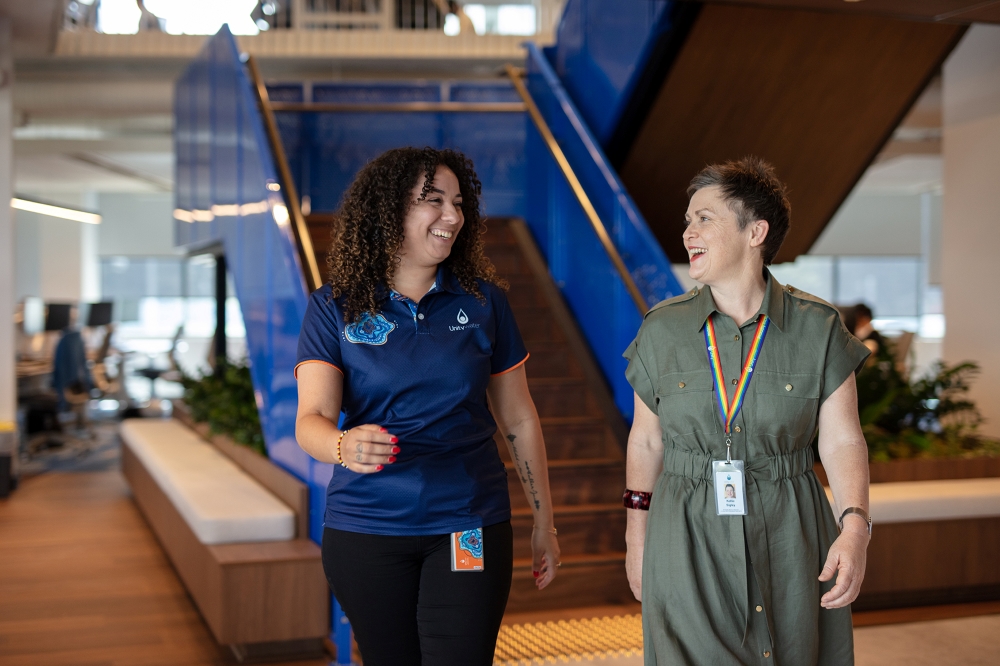 Unitywater team members walking in office