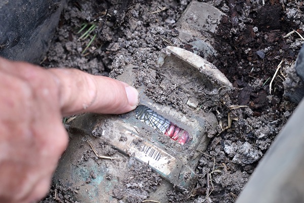 Damaged water meter with cracked glass