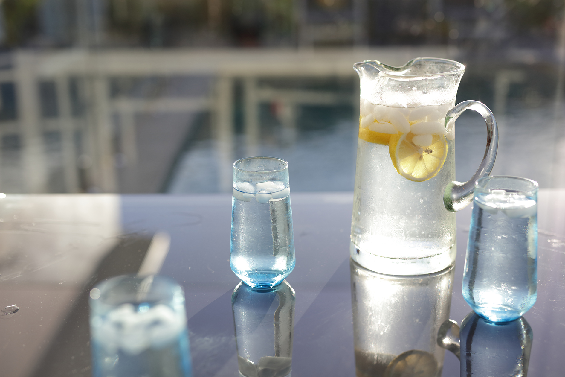 Water refreshment on table in residential backyard