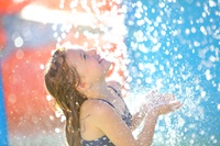 Girl playing in water park